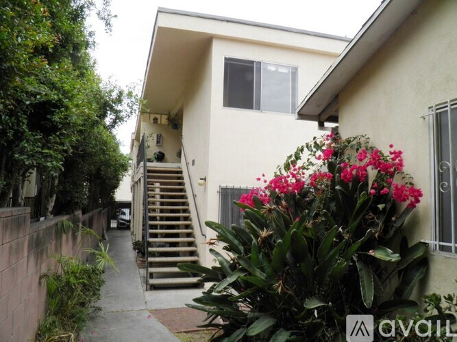 A house with a staircase leading to the second floor.