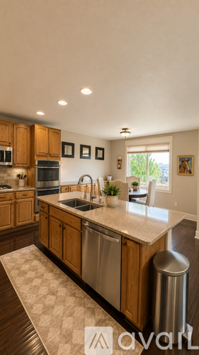 A kitchen with wooden cabinets and a white countertop.