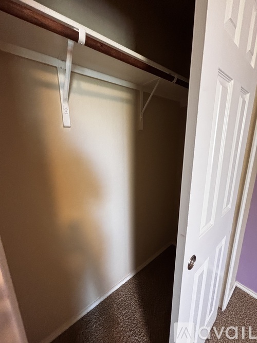 A white door is on the right side of the image.