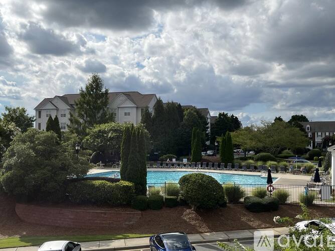 A large house with a pool in the backyard.