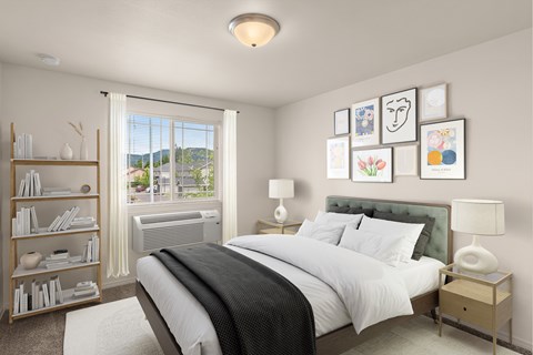A bedroom with a large bed, a nightstand, and a bookshelf.