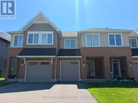 A large house with a garage is for sale.