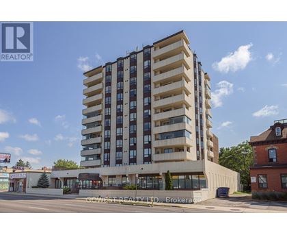 A tall building with a sign that says "REALTOR" on it.