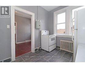 A room with a Keller Williams Energy logo on the wall.