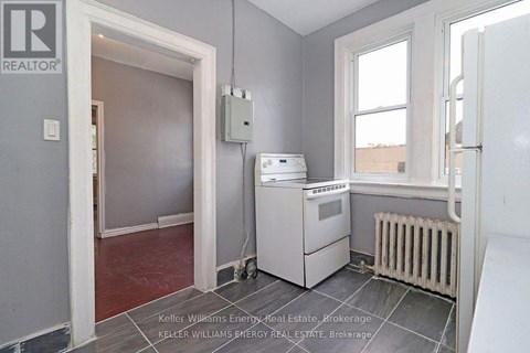 A room with a Keller Williams Energy logo on the wall.