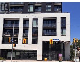 A white building with the words 168 Bloor on the front.