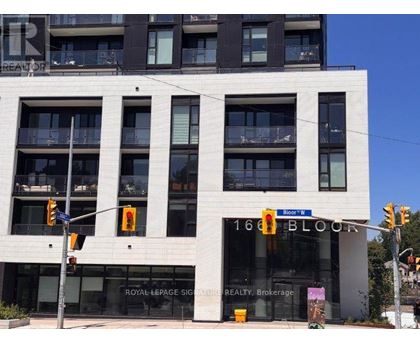 A white building with the words 168 Bloor on the front.