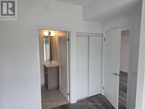 A bathroom with a sink, mirror, and medicine cabinet.