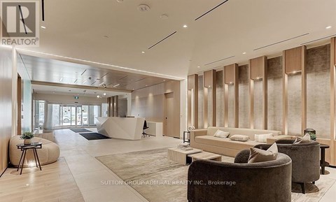 A modern living room with a sofa set and a coffee table.