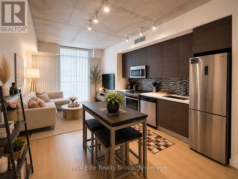 A modern kitchen with a dining table and chairs in the middle of the room.