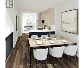 A dining room with a table set for four.