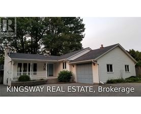 A house with the text "KINGSWAY REAL ESTATE, Brokerage" in front of it.