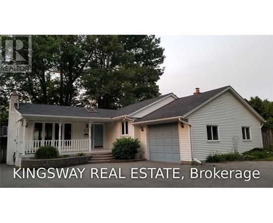 A house with the text "KINGSWAY REAL ESTATE, Brokerage" in front of it.