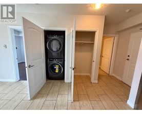 A laundry room with a washer and dryer in it.