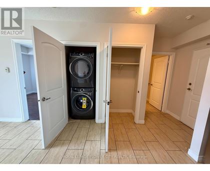 A laundry room with a washer and dryer in it.