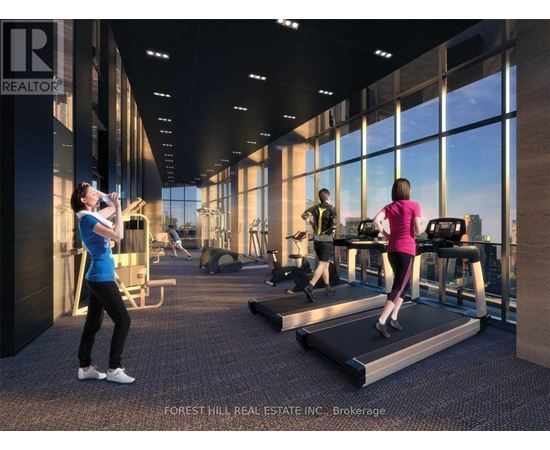A gym with people exercising and a sign that says REALTOR.