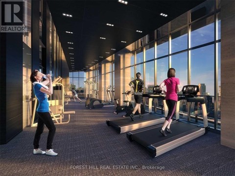 A gym with people exercising and a sign that says REALTOR.