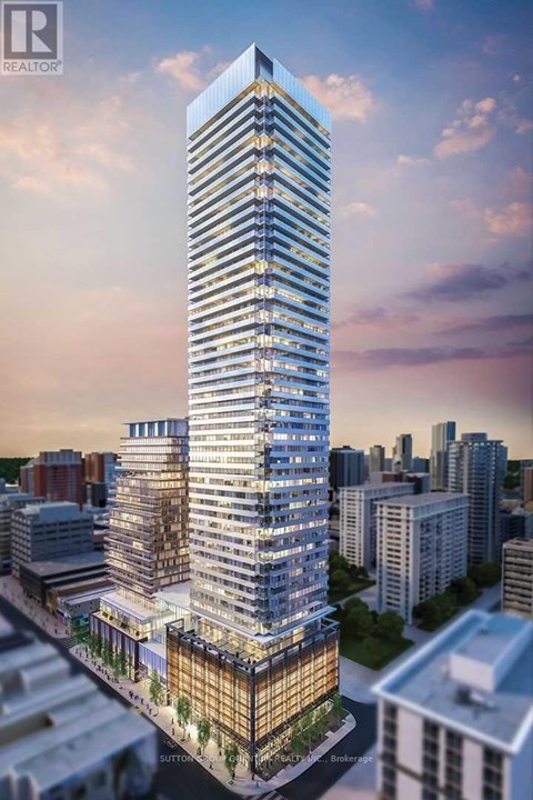 A tall, modern skyscraper with a glass facade is the focal point of the image.
