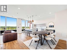 A modern dining room with a large table and chairs.