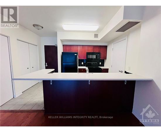 A realtor photo of a clean, empty office space.