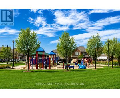 A playground with a slide and swings in a park.