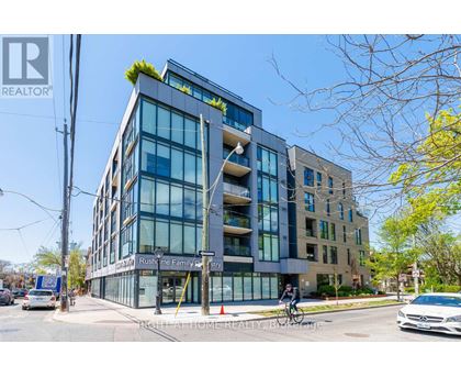 A modern multi-story building with a glass facade and a sign that reads "Rush Time Family Dentistry.".