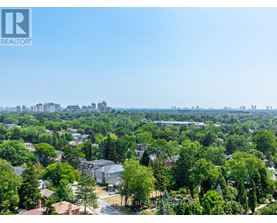 A bird's eye view of a residential area with houses and trees.