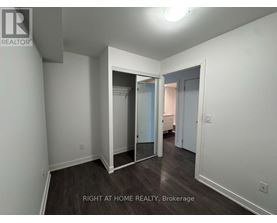 A room with a doorway leading to another room.