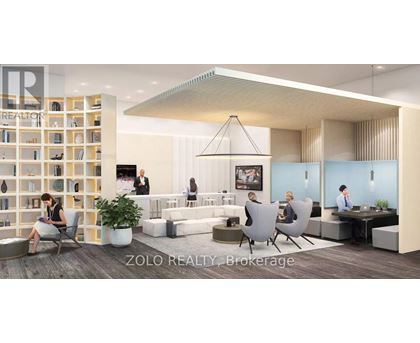 A modern office space with people working and a woman sitting on a chair.