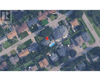 A satellite image of a residential area with streets named Starwood Rd, St Claire Ave, and Oval LePage Pkwy.
