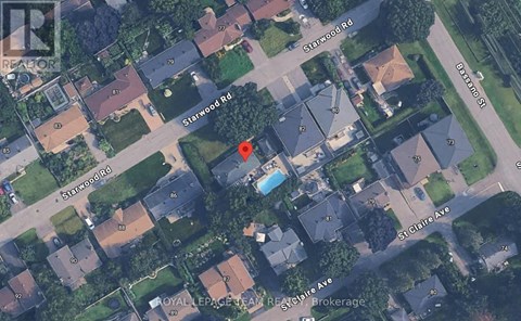 A satellite image of a residential area with streets named Starwood Rd, St Claire Ave, and Oval LePage Pkwy.
