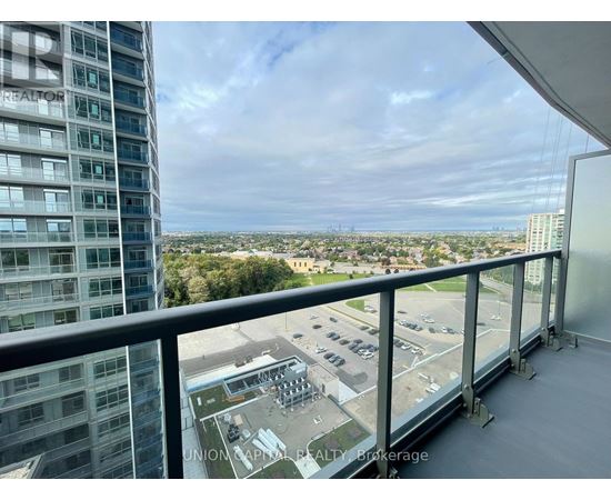 A balcony view of a cityscape with a building named "CREATOR" in the foreground.