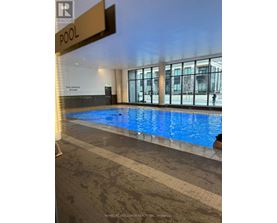A pool with a sign that says "POOL" above it.