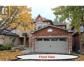 A house with a front view and a garage.