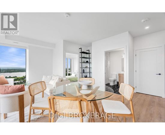 A modern dining room with a glass table and chairs.