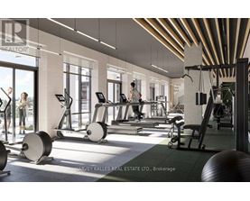 A gym with a variety of equipment including treadmills, weights, and exercise machines.