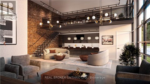 A living room with a brick wall and a staircase.
