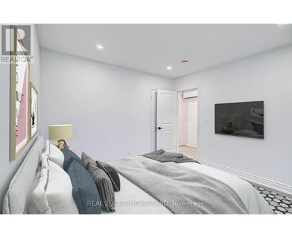 A bedroom with a bed, lamp, and painting on the wall.