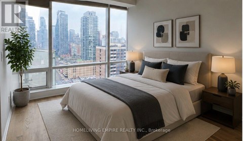 A bedroom with a large bed and a view of the city.