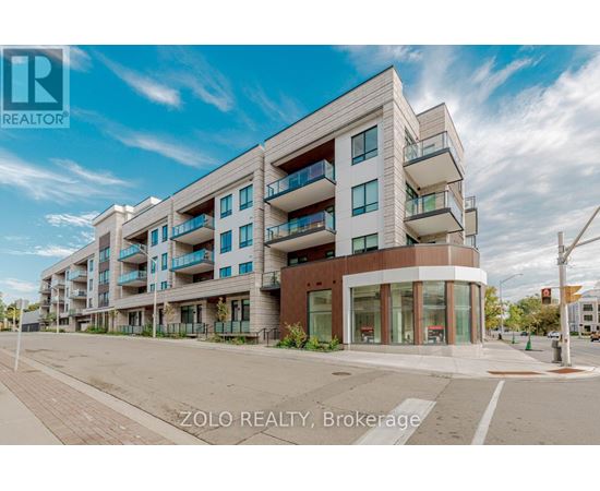 A modern apartment building with balconies and a clear sky in the background.