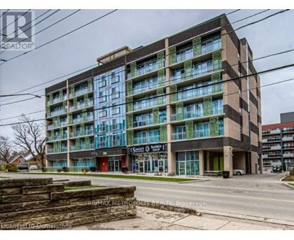 A large building with a lot of windows and a sign that says "1 Smart Builder".