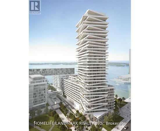 A tall, white residential building is the focal point of this image.