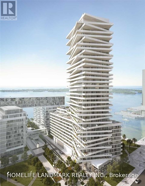 A tall, white residential building is the focal point of this image.