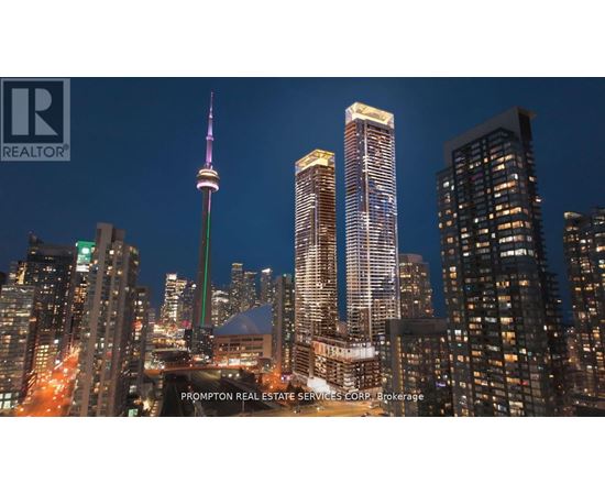A cityscape at night with the CN Tower prominently displayed.