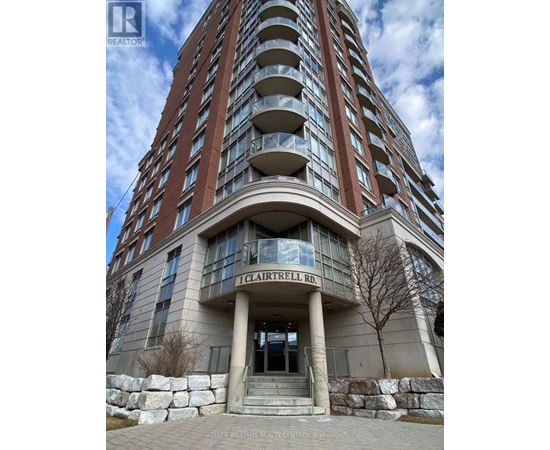 A tall building with the name "I Clairet Rd" on the front.