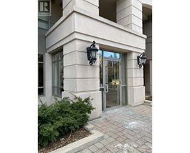 A building with a glass door and a sign that says REALTOR.