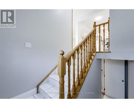 A white door is on the left and a white door is on the right.