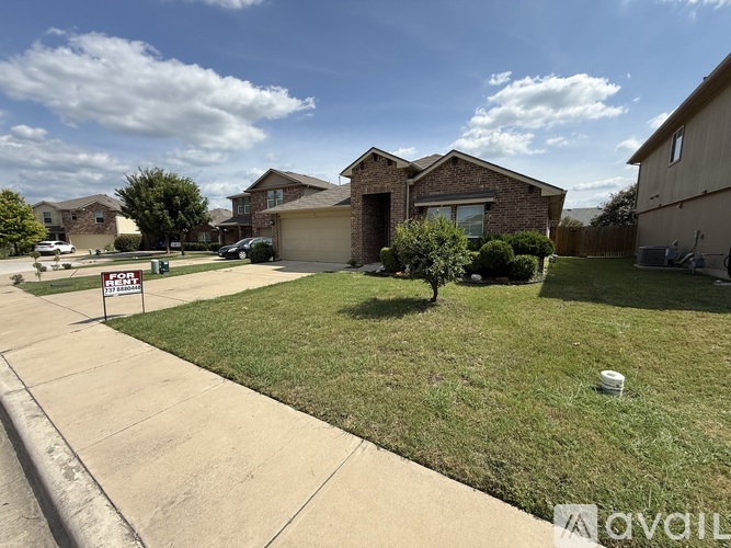 A house with a yard is for sale.