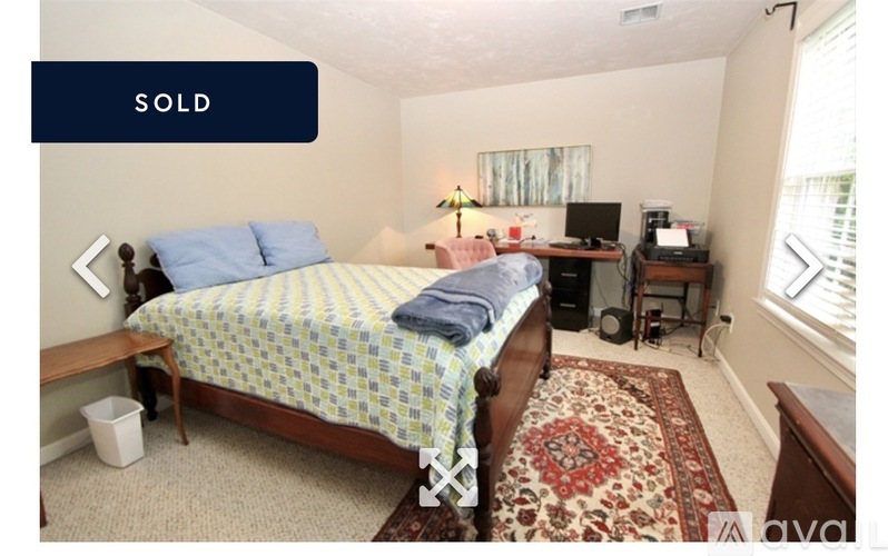 A bedroom with a bed, desk, and chair is marked as sold.