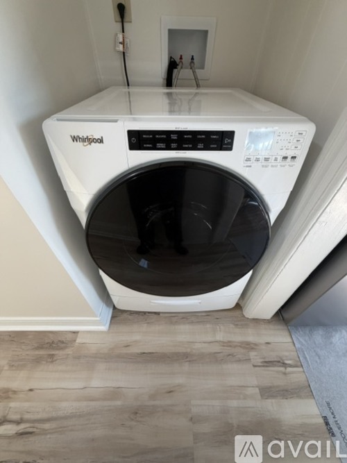 A Whirlpool washing machine is available for purchase.